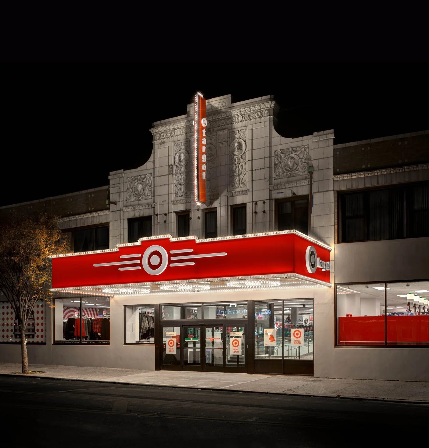 The landmark Brooklyn Target theater storefront at night.